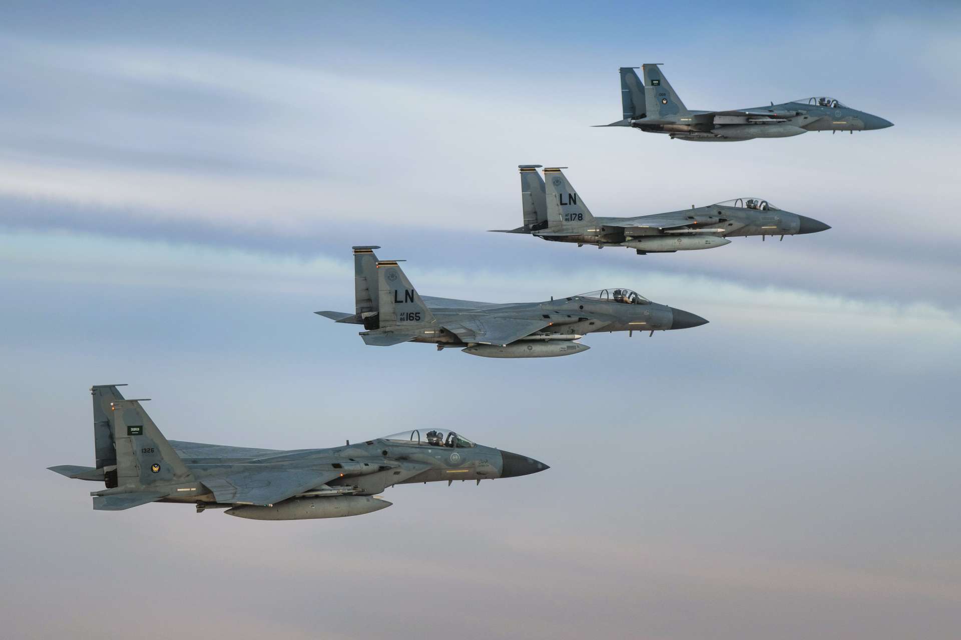 Royal Saudi Air Force and U.S. Air Force F-15C Eagles fly in formation over the U.S. Central Command area of responsibility on June 2, 2019, demonstrating joint cooperation and operational interoperability (Picture Source: Royal Saudi Air Force / U.S. Air Force)