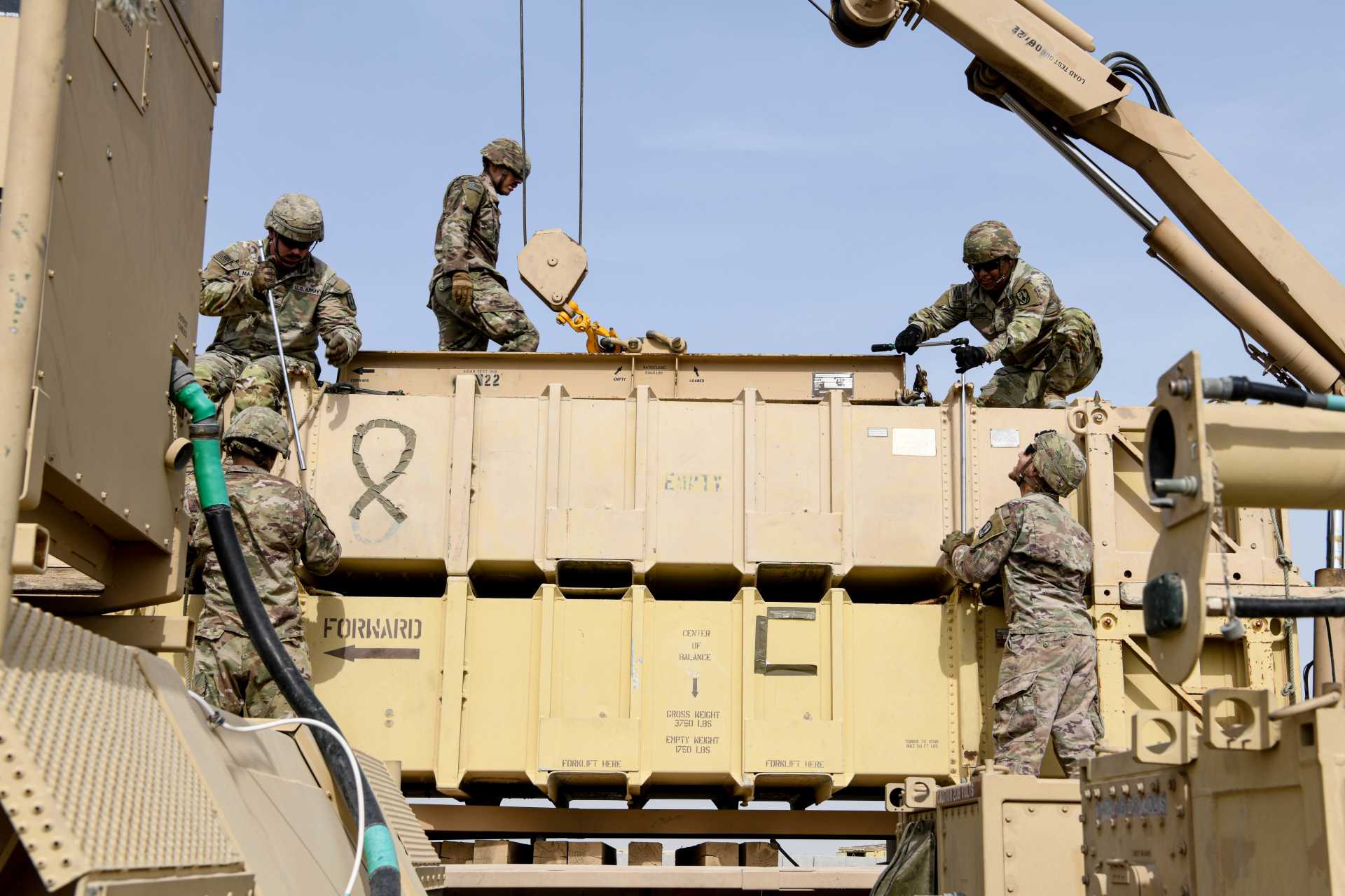 Patriot missile reload crew assigned to the U.S. Army's 4th Battalion, 3rd Air Defense Artillery Regiment secures a Patriot Guidance Enhanced Missile-Tactical (GEM-T) interceptor during a reload certification exercise at Al Dhafra Air Base, United Arab Emirates, on July 28, 2022. The GEM-T interceptor is the missile variant selected under the new NSPA contract awarded to Raytheon for Poland, reinforcing NATO's expanding air and missile defence capabilities. (Photo: U.S. Department of Defense)