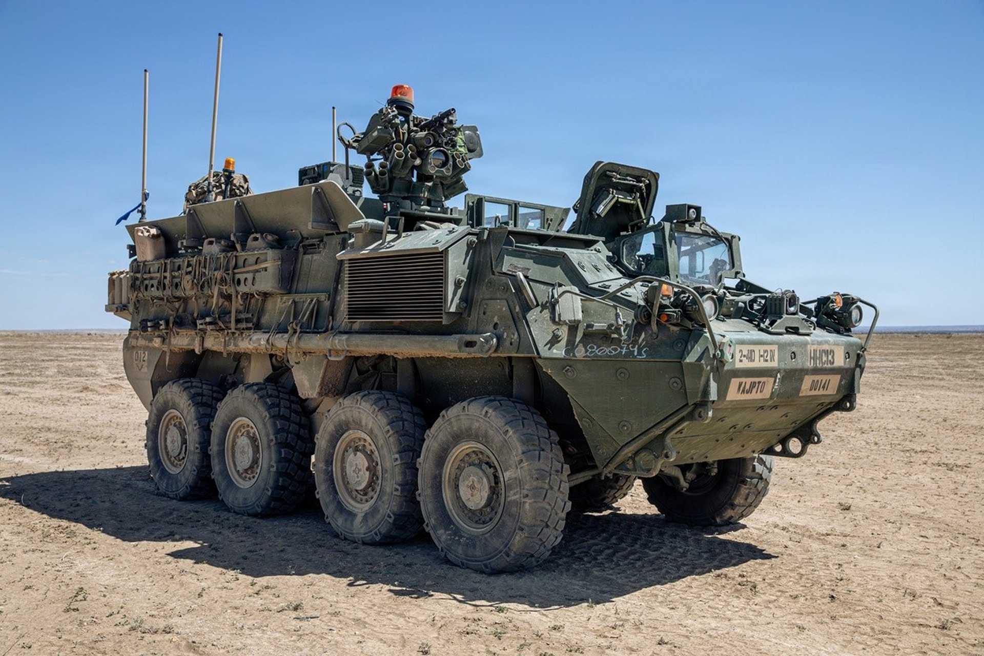 Stryker 8x8 armored combat vehicles assigned to the 1st Battalion, 12th Infantry Regiment, 2nd Stryker Brigade Combat Team, 4th Infantry Division, occupy defensive positions during a force-on-force exercise conducted as part of Exercise Ivy Mass at the Piñon Canyon Maneuver Site, Colorado, on May 13, 2026.