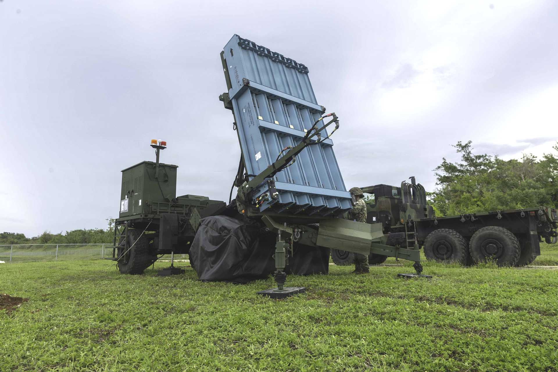 U.S. Marines assigned to III Marine Expeditionary Force inspect the Medium-Range Intercept Capability (MRIC) air defense system during readiness checks at Mason Range, Guam, on June 24, 2026, ahead of a live-fire event conducted as part of Exercise Valiant Shield 2026. (U.S. Department of War/Defense)