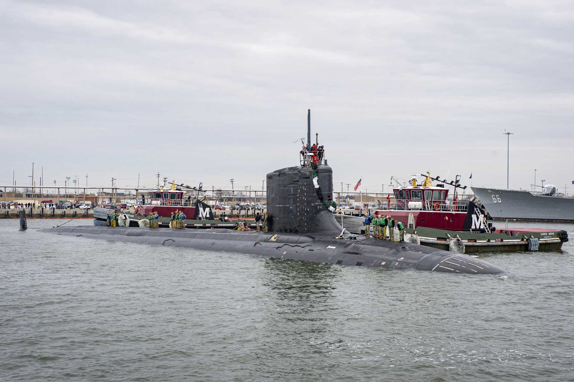 The installed component is a copper-nickel flange, a critical element typically used in critical piping systems and structural interfaces within submarines, where it must withstand high pressure, corrosion, and continuous operational stress. (Picture source: U.S. Navy)