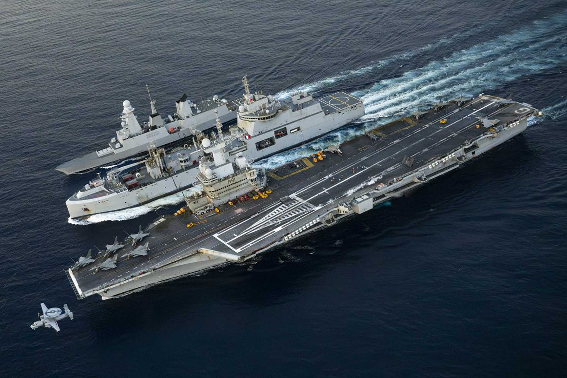 France deployed the aircraft carrier Charles de Gaulle and its escorts toward the Gulf of Aden, near the Strait of Hormuz, to protect commercial shipping routes disrupted by the Iran war without directly joining U.S military operations against Iran. (Picture source: French Navy)