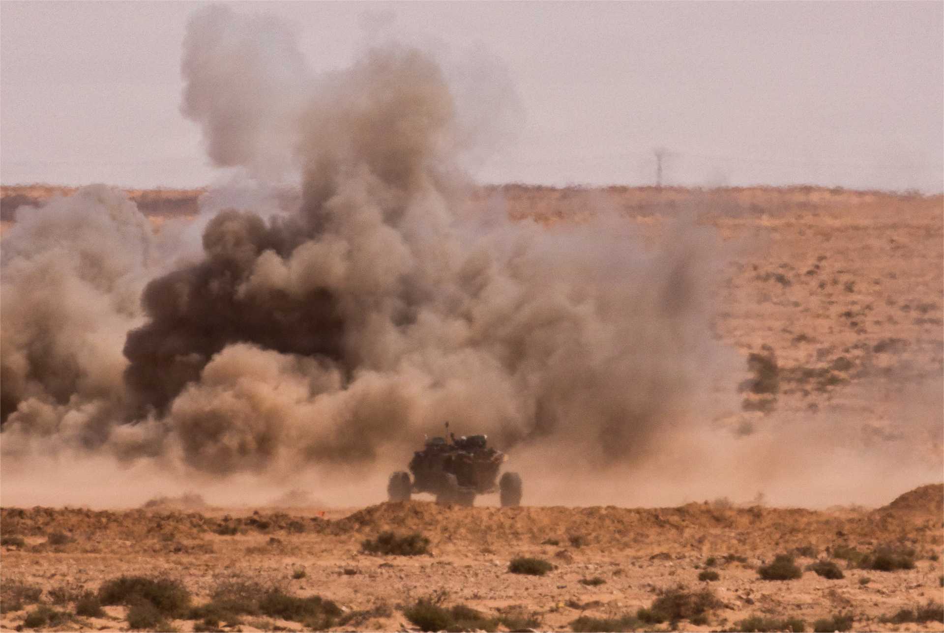 An unmanned ground vehicle supports a live counterattack exercise during African Lion 26 at Cap Draa, Morocco, on May 4, 2026, as U.S. Army and Moroccan forces tested autonomous battlefield systems, robotic warfare tactics, and combined arms operations designed to reduce soldier exposure in future combat.