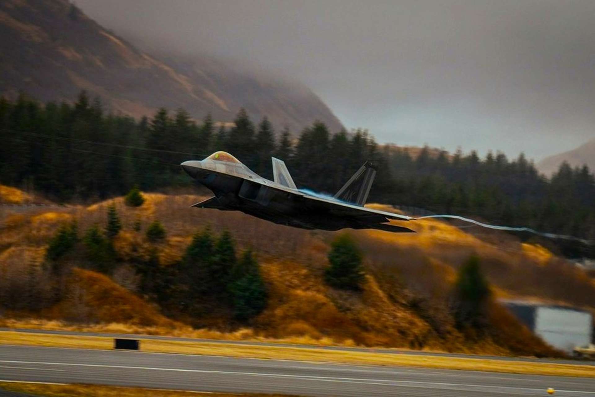 U.S. Air Force F-22 Raptors are strengthening NORAD’s Arctic-Pacific defense network by launching from dispersed Alaskan locations to improve rapid interception, survivability, and deterrence across North America’s northern approaches (Picture Source: U.S. Air Force)