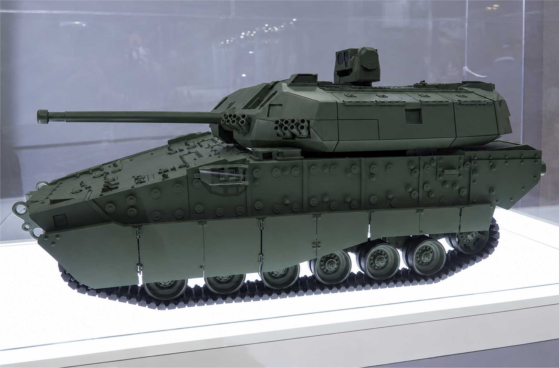 AI-assisted illustration of the General Dynamics Land Systems (GDLS) XM30 Wolf next-generation infantry fighting vehicle, based on the scale model displayed at AUSA 2026. The vehicle is being developed for the U.S. Army's Bradley replacement program. (Image: AI-generated, based on GDLS scale model at AUSA 2026)