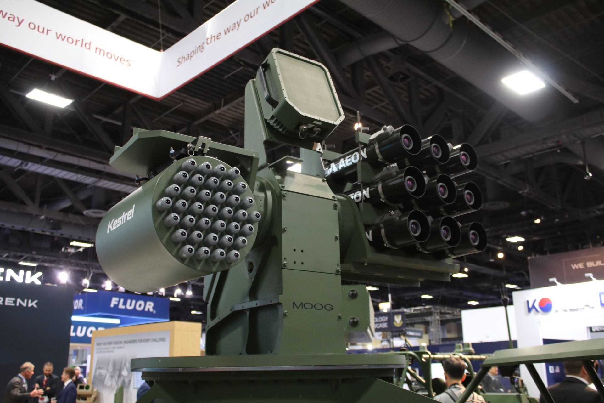 Moog showcased its Lightweight RIwP at AUSA 2026 as a compact, modular air defense turret designed to integrate missiles, guns, sensors, and counter-drone technologies on lighter military vehicles and robotic systems (Picture Source: Army Recognition Group)