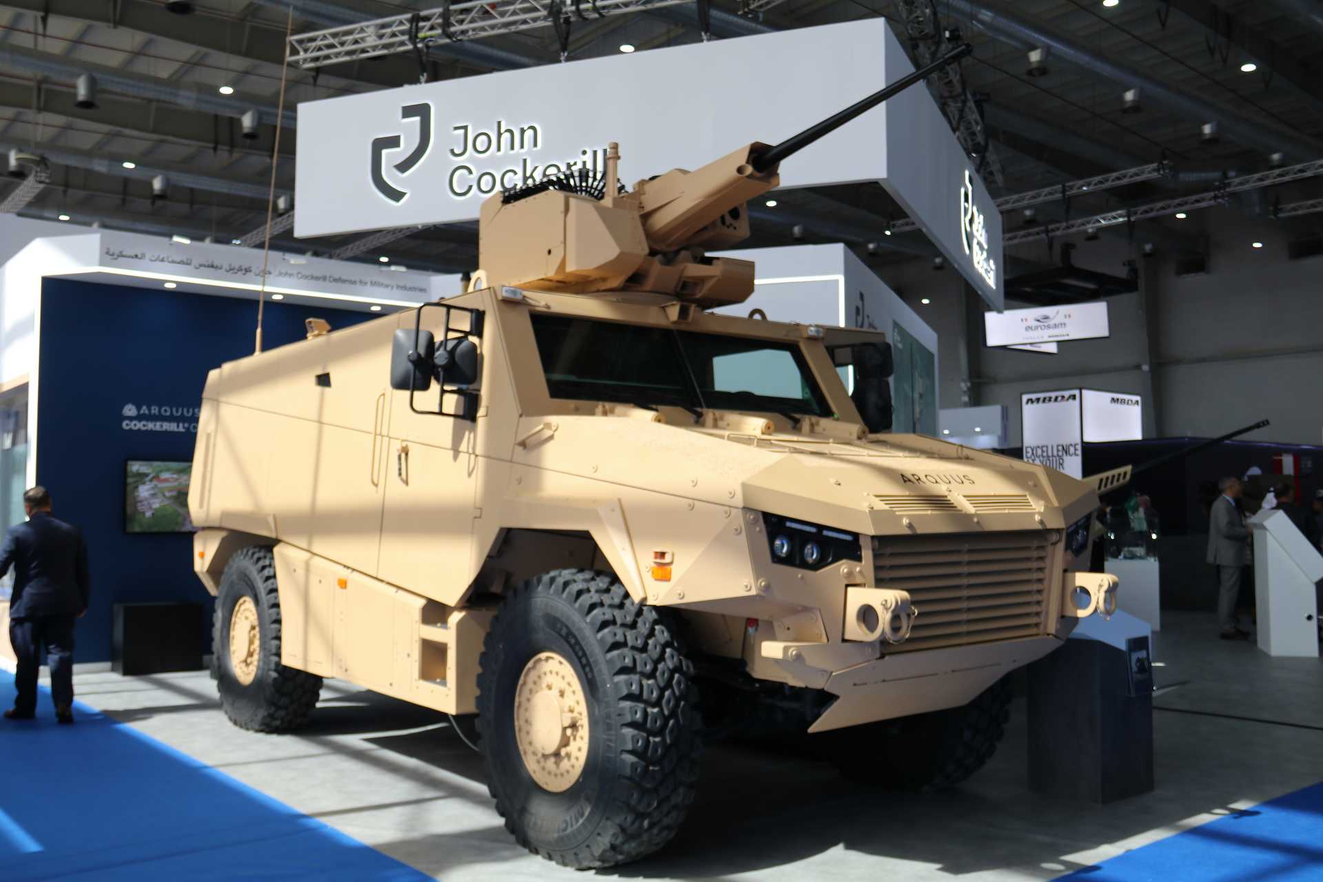 ARQUUS MAV’RX 4x4 armored vehicle displayed at WDS 2026 in Saudi Arabia, fitted with the John Cockerill Defense CLWS unmanned weapon station armed with a medium-caliber automatic cannon.