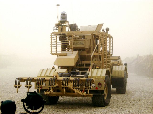 The sensor SCISSOR-G is mounted on a vehicle, usually a Husky, using a 10-inch turret with state-of-the-art infrared and high-definition color cameras. (Photo Credit: U.S. Army) 