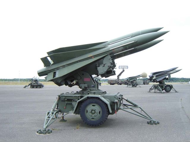M192 Launcher unit (LCHR): LCHR supports up to three ready to fire missiles and is activated only on the initiation of the fire cycle. When the fire button is activated in the BCC or PCP, several launcher functions occur simultaneously: the launcher slew's to designated azimuth and elevation angles, power is supplied to activate the missile gyros, electronic and hydraulic systems, the launcher activates the missile motor and launches the missile. 