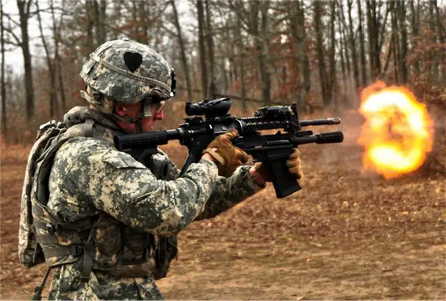 Sgt. Vincent Mennell, a combat engineer with Company A, 2nd Brigade Special Troops Battalion, 2nd Brigade Combat Team, 101st Airborne Division (Air Assault), fires the newly issued M26 Modular Accessory Shotgun System at Range 44b on Fort Campbell, Ky., Feb. 10, 2012. The 2nd BCT, also known as the Strike Brigade, is the first unit in the Army to be issued the future weapon.
