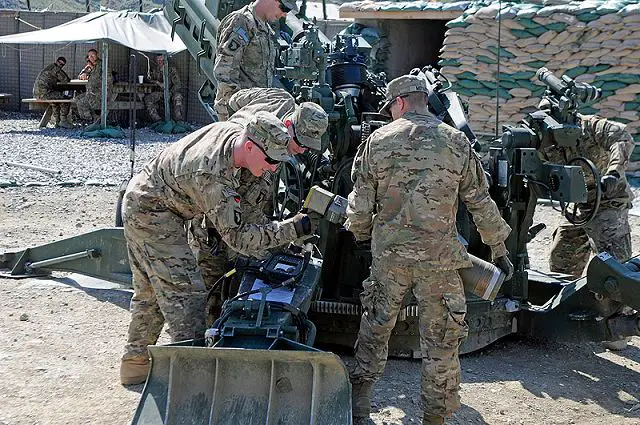 U.S. Army Soldiers with Battery A, 2nd Battalion, 320th Field Artillery, 1st Brigade Combat Team, 101st Airborne Division, practice using the Enhanced Portable Inductive Artillery Fuse Setter on a XM1156 Precision Guidance Kit Fuse and the M795 Rocket-Assisted Projectile April 28, 2013 at Forward Operating Base Joyce, Kunar Province, Afghanistan.
