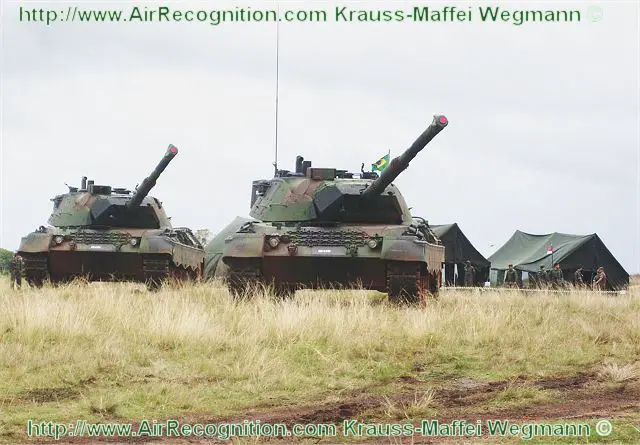 Krauss-Maffei Wegmann (KMW), Europe’s market leader for armoured wheeled and tracked vehicles, and the Brazilian Army signed a comprehensive Industrial Logistic Support (ILS) contract. For a substantial two-digit million figure [Euro] KMW will provide comprehensive technical support for the main battle tanks LEOPARD 1A5 of the Brazilian Army in the next five years. The work will be conducted by the newly founded KMW subsidiary KMW do Brasil in Santa Maria (Brazil)