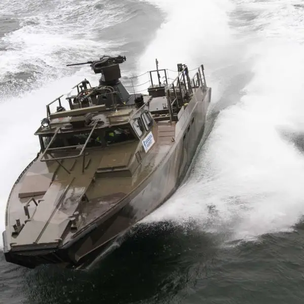 The CB90 is a Swedish fast assault craft designed to move 18 equipped troops directly onto shallow shorelines at 40 to 45 knots, combining a 0.8 to 0.9 m draught and twin-waterjet propulsion with up to 1,800 hp. (Picture source: Saab)
