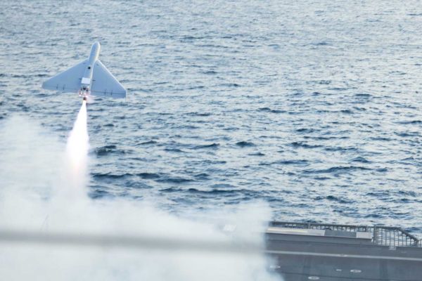 A U.S. military LUCAS (Low-Cost Uncrewed Combat Attack System) one-way attack drone launches from the flight deck of the U.S. Navy Independence-class littoral combat ship USS Santa Barbara (LCS 32) in the Arabian Gulf, demonstrating its potential for ship-based long-range precision strike operations.