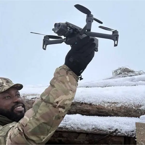 British soldiers from Dreadnaught Squadron, Royal Tank Regiment, operate a small tactical drone during sUAS training in Estonia, enhancing battlefield reconnaissance capabilities in coordination with NATO forces.