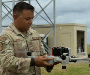 U.S. Air Force Tech. Sgt. Nathan A. Duarte, 6th Security Forces Squadron unmanned aircraft systems program manager, inspects a Bumblebee V2 drone interceptor during counter-drone training at MacDill Air Force Base, Florida.