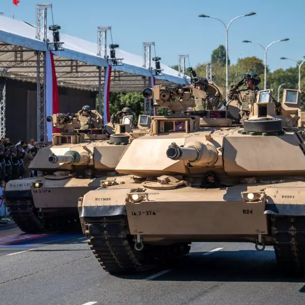 U.S. Army M1A2 Abrams tanks from the 2nd Battalion, 37th Armored Regiment, parade through Warsaw during Poland’s Armed Forces Day on August 15, 2026, as part of the NATO Forward Land Forces Battle Group-Poland. (Picture source: Poland MoD)