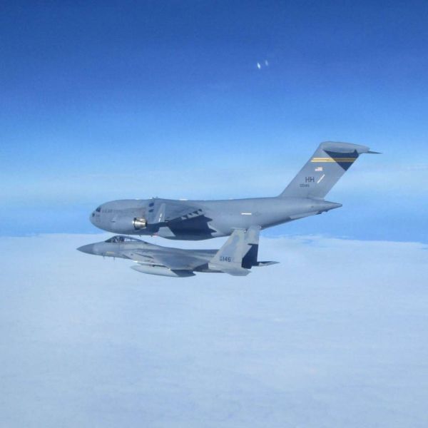 An Air National Guard F-15C Eagle rehearsed a long-range interception of a C-17 during AMALGAM DART 2026, testing NORAD’s ability to defend protected North American airspace (Picture Source: U.S. Air Force)