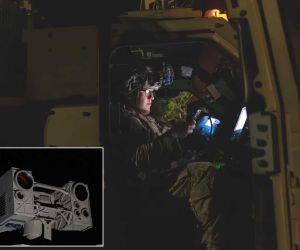 U.S. Army soldier operates the AMP-HEL high-energy laser weapon during counter-UAS operations, using directed energy to detect, track and defeat hostile drones while reducing reliance on conventional kinetic interceptors.