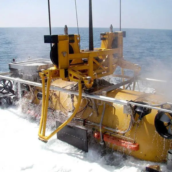 At the heart of the Submarine Rescue Diving Recompression System (SRDRS) is the PRM-1 Falcon, a tethered, remotely operated rescue vehicle that can dive down to 2,000 feet (610 meters), mate with a submarine hatch at angles up to 45 degrees, and rescue up to 16 personnel per trip. (Picture source: US Navy)