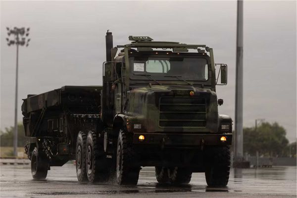 A U.S. Marine Corps Medium Tactical Vehicle Replacement tows an AN/TPS-80 Ground/Air Task-Oriented Radar during Marine Rotational Force–Southeast Asia training in the Philippines on August 17, 2026.