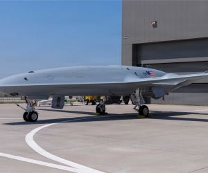 The Boeing MQ-25A Stingray is a U.S. Navy carrier-based unmanned aerial refueling aircraft designed to extend the operational range of carrier air wings while freeing F/A-18E/F Super Hornet fighters from tanker missions. The aircraft is intended to deliver up to 15,000 pounds of fuel at a distance of 500 nautical miles from an aircraft carrier. (Picture source: U.S. Department of War/Defense)