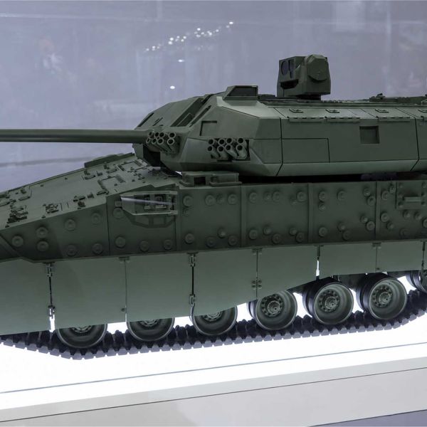 AI-assisted illustration of the General Dynamics Land Systems (GDLS) XM30 Wolf next-generation infantry fighting vehicle, based on the scale model displayed at AUSA 2026. The vehicle is being developed for the U.S. Army's Bradley replacement program. (Image: AI-generated, based on GDLS scale model at AUSA 2026)