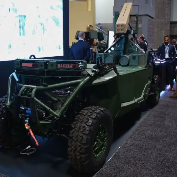 Overland AI's new IBEX autonomous ground vehicle equipped with an Arnold Defense LAND-LGR4 laser-guided rocket launcher on display at AUSA 2026 in Washington, D.C. (Picture source: Army Recognition Group)
