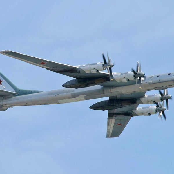 Satellite imagery shows a Tu-95MS with the entire tail section detached and lying behind the main airframe, making restoration to flying condition technically unrealistic. (Picture source: Wikimedia/Sergey Kustov and X/AviVector)