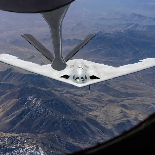 A B-21 Raider joins a KC-135 Stratotanker during flight testing. The U.S. Air Force has begun construction of a new B-21 final assembly line at Plant 42 in Palmdale, California, as part of an expansion designed to increase annual Raider production capacity by 25 percent.