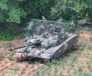 Images appearing to show Royal Thai Army T-84 Oplot-T tanks with foldable overhead mesh suggest Thailand is testing low-cost protection against FPV drone attacks (Picture Source: Social Media)