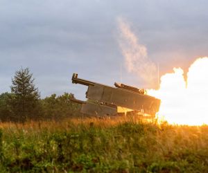 A U.S. Army M142 HIMARS assigned to 1-17 Long Range Fires Battalion, 3d Multi-Domain Task Force, fires during Exercise Orient Shield 26 at Yausubetsu Training Area, Hokkaido, Japan, on September 21, 2026. HIMARS complements Typhon and NMESIS within the expanding U.S. land-based strike arsenal, with its target options and reach determined by the ammunition carried. (Picture source: U.S. Department of War/Defense)