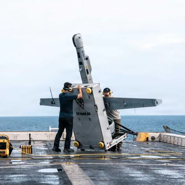 U.S. Department of War contractors prepare a VBAT vertical take-off and landing (VTOL) unmanned aerial system for launch aboard the San Antonio-class amphibious transport dock ship USS Portland (LPD 27) during operations in the Pacific Ocean on June 9, 2026. (Picture source: U.S. DoD)