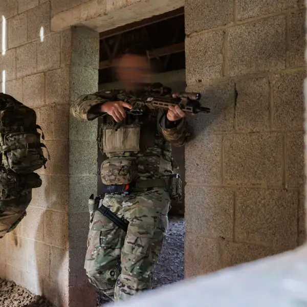 U.S. Army Green Berets from the 1st Battalion, 10th Special Forces Group (Airborne), practice room-clearing tactics during urban warfare training at Baumholder, Germany, on October 14, 2026, strengthening their readiness for operations in complex urban environments across Europe. (Picture source: U.S. Department of War/Defense)