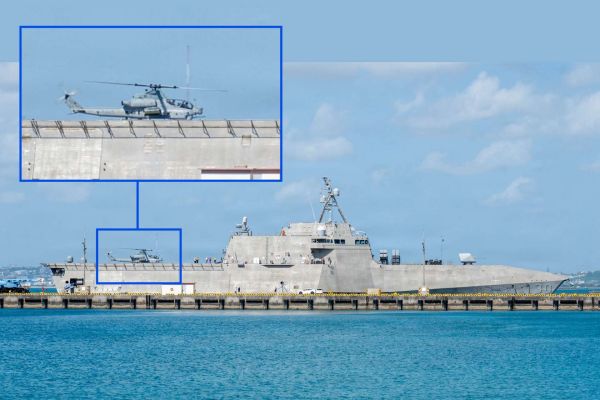 USS Canberra’s integration with a Marine Corps AH-1Z Viper in Okinawa demonstrates how littoral combat ships could serve as distributed aviation nodes for armed helicopters across the Indo-Pacific (Picture Source: U.S. Navy)