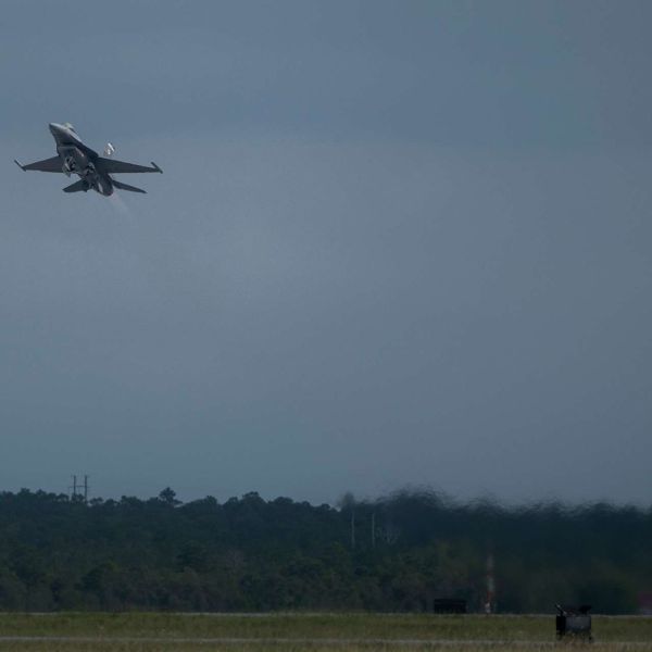 A U.S. Air Force F-16 Fighting Falcon fighter jet modified for the Viper Experimentation and Next-generation Operations Model–Autonomy Flying Testbed (VENOM) program conducts autonomous systems flight testing at Eglin Air Force Base, Florida, in June 2026.