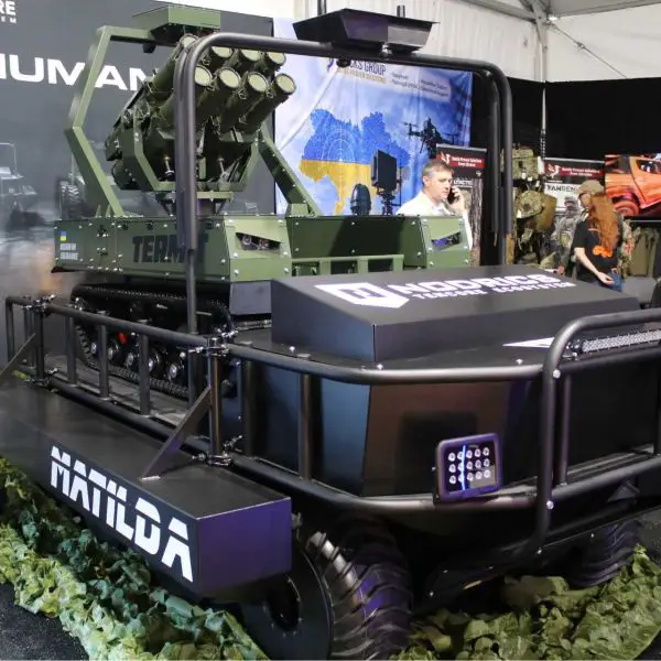 At AUSA 2026, Tencore displayed the new MAT1LDA amphibious 8×8 UGV carrying a smaller electric tracked TerMIT 2.0 robot armed with RPV-18 thermobaric rocket-propelled flamethrowers. (Picture source: Army Recognition)