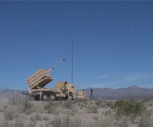 A U.S. Army Indirect Fire Protection Capability (IFPC) missile launcher is raised into position during operations at White Sands Missile Range, New Mexico, on July 28, 2026. The U.S. Army has selected four companies to develop affordable interceptors for potential integration with its IFPC air-defense architecture. (Picture source: U.S. Army / Sgt. Michael Majors)