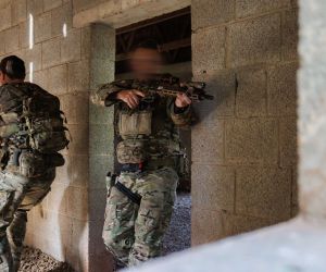 U.S. Army Green Berets from the 1st Battalion, 10th Special Forces Group (Airborne), practice room-clearing tactics during urban warfare training at Baumholder, Germany, on October 14, 2026, strengthening their readiness for operations in complex urban environments across Europe. (Picture source: U.S. Department of War/Defense)