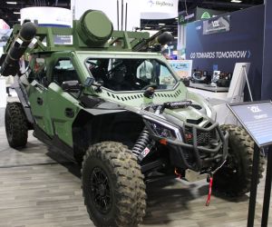 The V2X Tempest counter-UAS vehicle displayed at AUSA 2025 combines a Can-Am 4x4 platform with two AGM-114L Longbow Hellfire missiles and a RADA RPS-42 radar. (Picture source: Army Recognition)