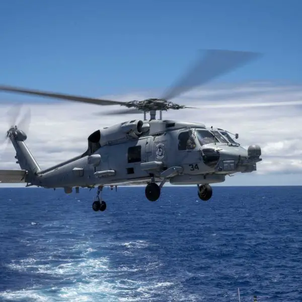 A U.S. Navy MH-60R Seahawk conducts antisubmarine warfare operations during RIMPAC 2026 off Hawaii.