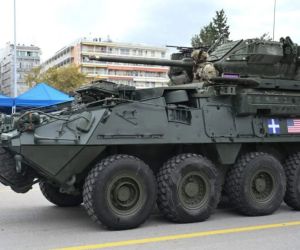A U.S. Army M1296 Stryker Dragoon 8x8 armored vehicle equipped with a 30 mm automatic cannon participates in Greece's national military parade in Thessaloniki on October 28, 2026, ahead of a planned transfer of Stryker vehicles to the Hellenic Army. (Picture source: Greek Ministry of National Defence)