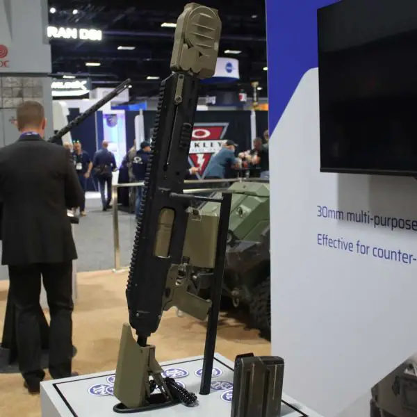 The FN MTL-30 is a semi-automatic 30 mm grenade launcher designed to engage enemy troops behind cover, small drones, and lightly armored vehicles at ranges of up to 500 meters, including with programmable airburst grenades. (Picture source: Army Recognition)