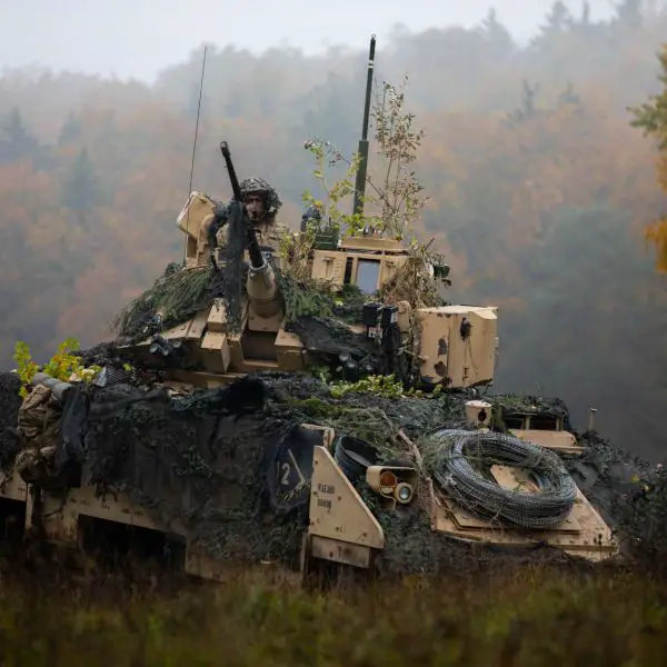 A U.S. Army M2 Bradley engages a simulated enemy at Hohenfels, highlighting NATO’s focus on armored interoperability and high-intensity warfare readiness (Picture Source: U.S. Army)