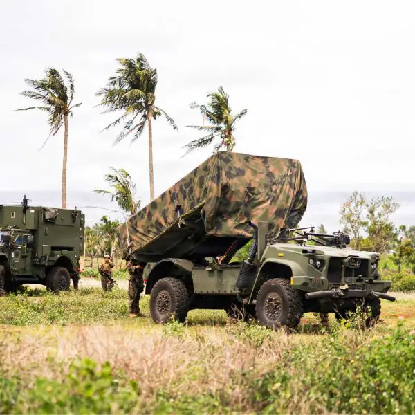 U.S. Marines operate an NMESIS battery equipped with Naval Strike Missile launchers during expeditionary training. The mobile anti-ship missile system is designed to support distributed sea-denial missions from dispersed coastal positions across the Indo-Pacific.