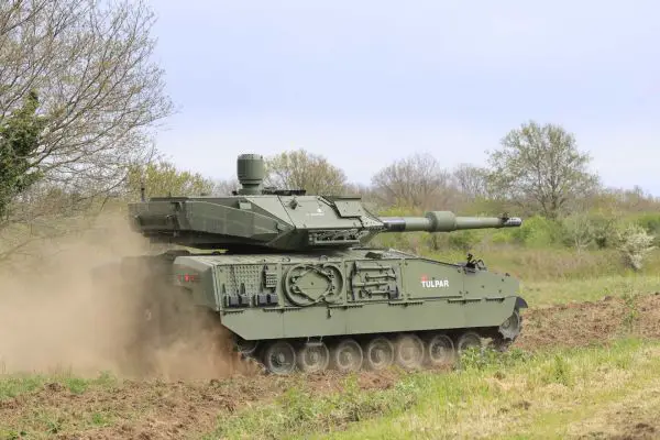 Turkish Otokar TULPAR medium tank fitted with Italian Leonardo’s HITFACT MkII 120 mm turret during live-fire trials, validating NATO-standard 120 mm firepower in both static and moving conditions.